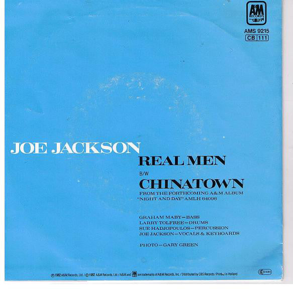 Joe Jackson : Real Men (7", Single)